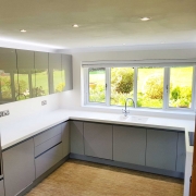 Handleless kitchen supplied by Taps and Tubs